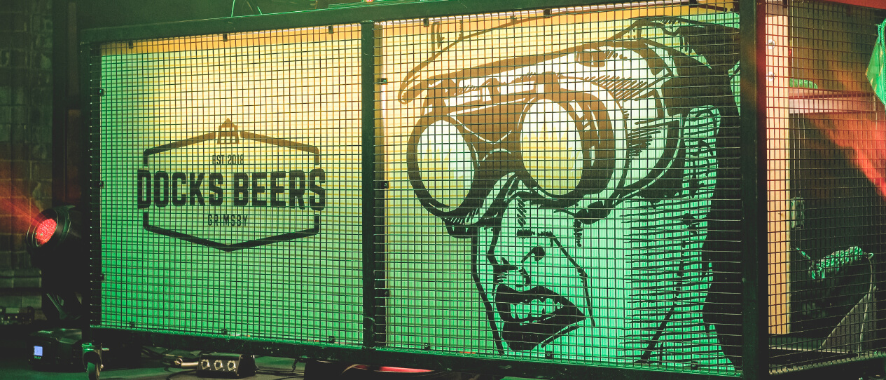 Docks Beers branding on a stage