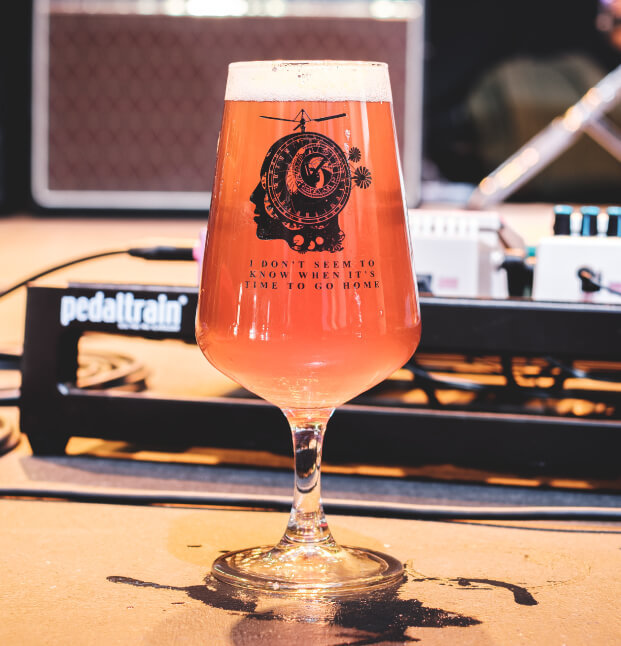Docks Beers - Sherlocks collab beer shown in a branded glass