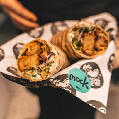 Mockingbird Streetfood photo showing a mock chicken wrap and packaging