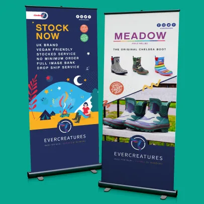 Evercreatures advertising boards shown on a green background