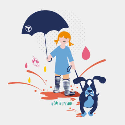 A girl is walking her dog in the rain on her way to work with an umbrella.
