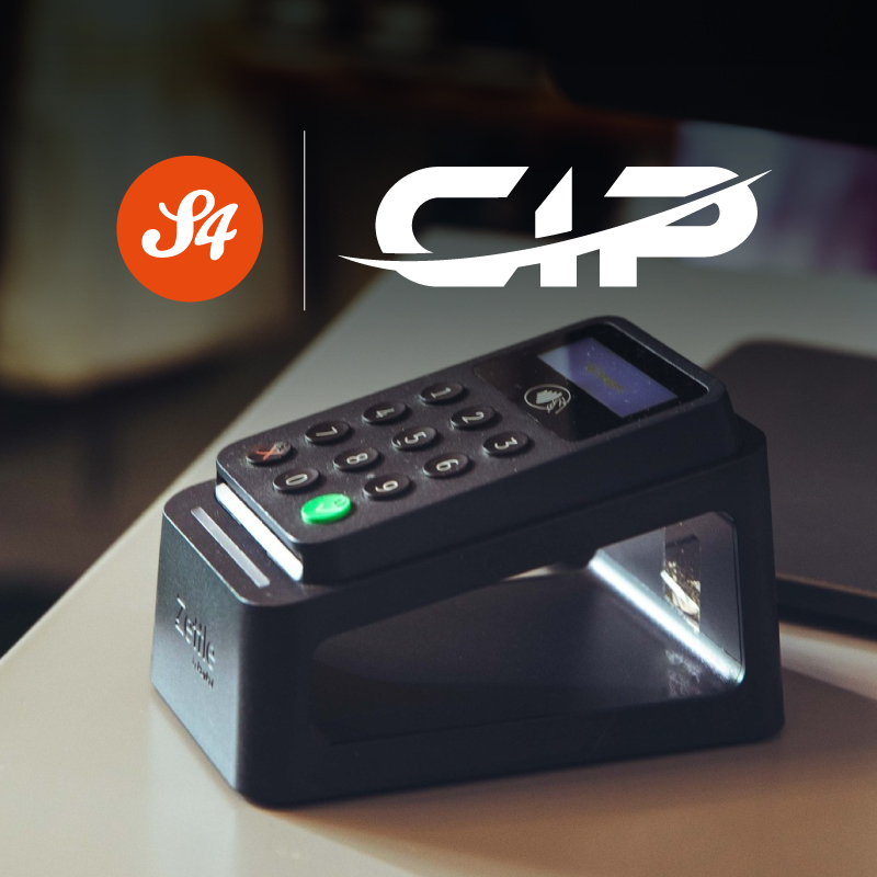 Introducing our new EPOS system, a phone with a cap logo on it sitting on top of a desk.